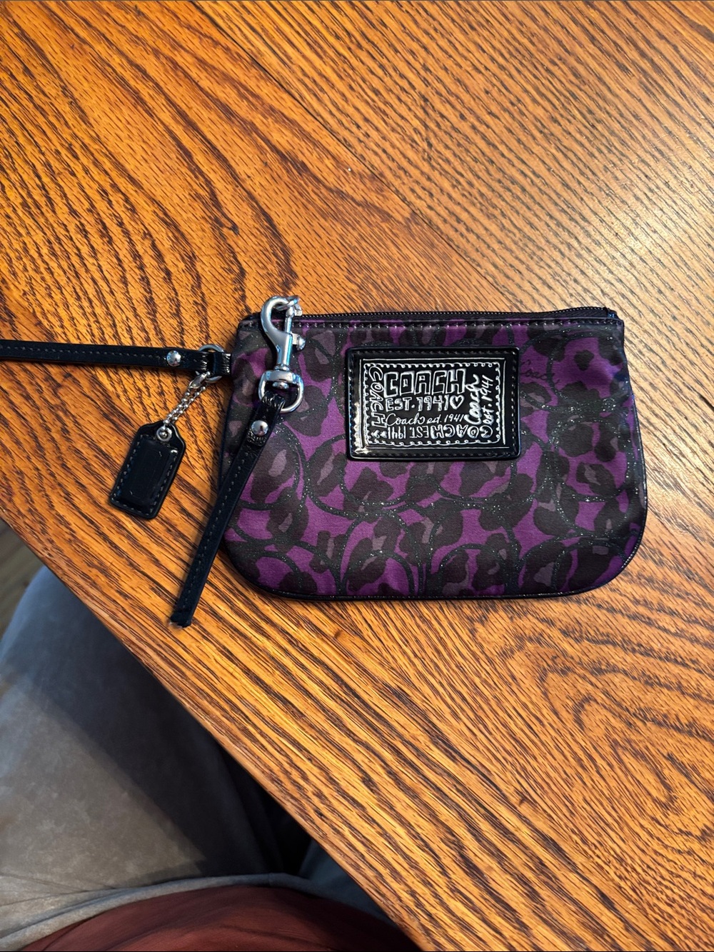 Coach poppy ocelot purple & black wristlet